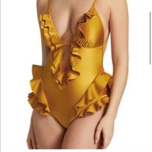 Zimmerman one piece. Brand new never worn. Size small.